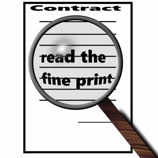 Image of magnifying glass over paper contract