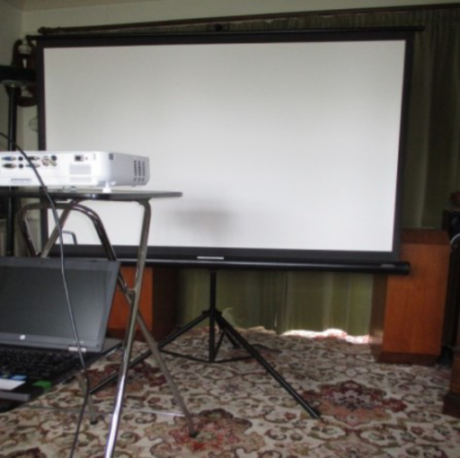 Image of an overhead projector and screen